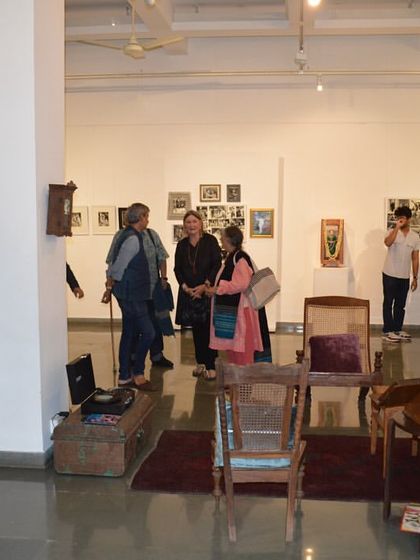 A wide shot of the preview, showing the living room installation as a central gathering point.