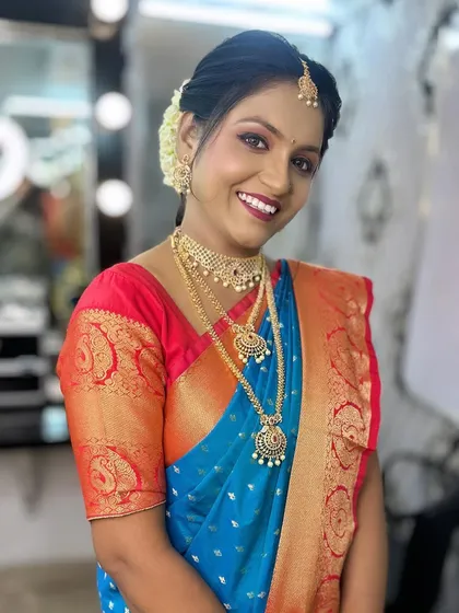 Another shot of the elegant South Indian bridal makeup, perfect for our student demonstration portfolio.
