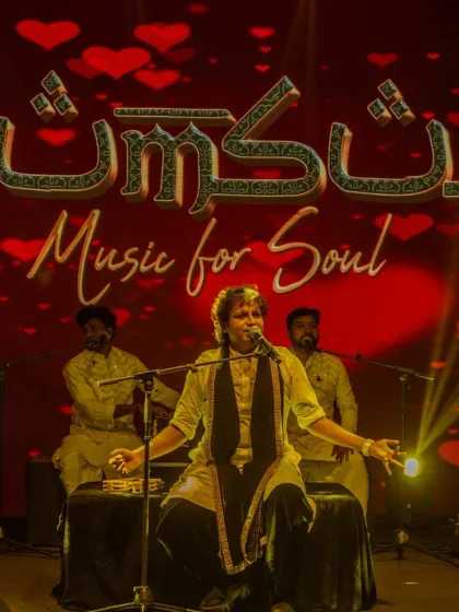 A beautiful stage setup at Taj Vivanta for a corporate event. The heart-themed backdrop was perfect for our soulful music.