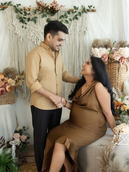 A joyful and candid moment between a couple. Their laughter and loving gaze make this a truly special and authentic portrait.