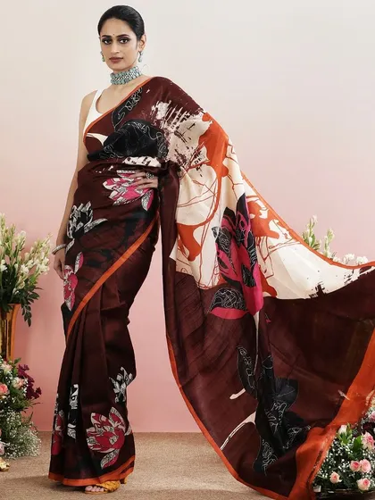 Another full view of the brown abstract floral saree, showcasing its unique design.