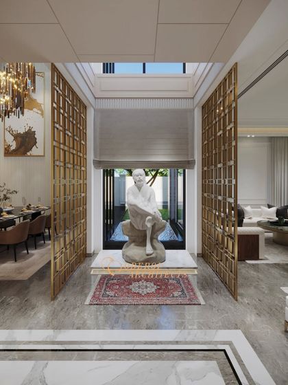 We create spaces for quiet reflection throughout the home. This alcove features a serene sculpture, framed by decorative gold screens and illuminated by a skylight.