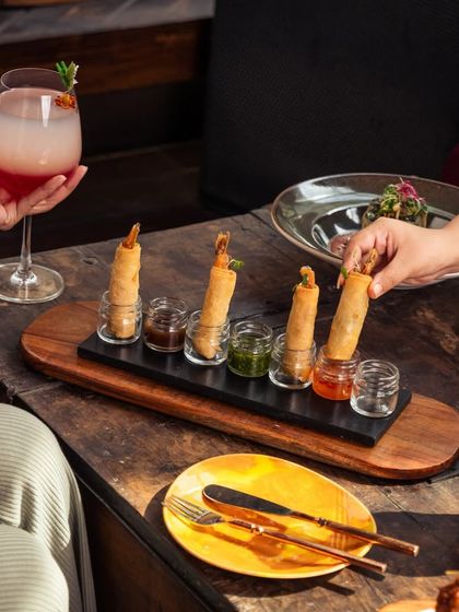 Crispy, flavorful, and packed with freshness. My spring rolls are the perfect bite-sized delight, served in an innovative shot glass presentation with an assortment of dipping sauces.