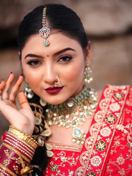 Here you can see the detail in my bridal eye makeup. For this lehenga look, I created a sharp, defined eye with a bold lip, ensuring the makeup was both striking and perfectly blended.