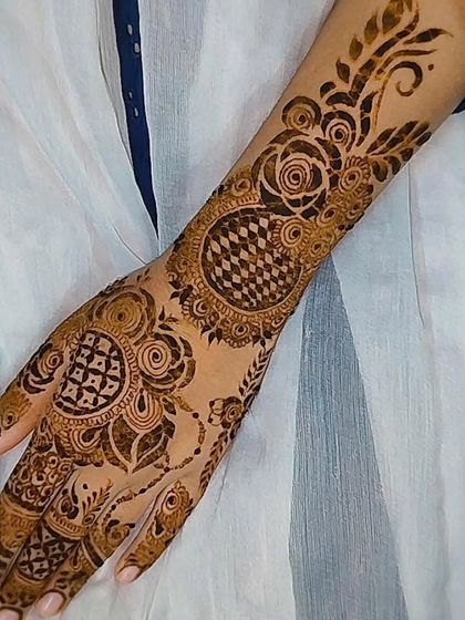 A beautiful design featuring a mix of roses, checkerboard patterns, and mandalas.