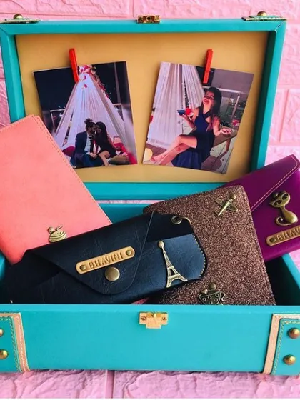 This travel accessories hamper was a joy to create. I customized a turquoise trunk and filled it with personalized passport covers, wallets, and spectacle cases for a client.