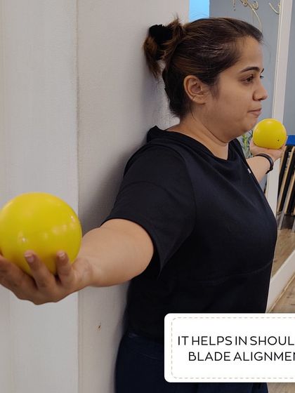 Using toning balls helps with shoulder blade alignment, a key component of good posture and preventing upper back pain.