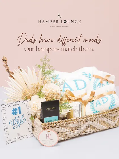 This hamper is designed for the dad who appreciates comfort and quality. It includes personalized "DAD" towels, gourmet treats, and a notebook, all presented in a beautiful woven basket.