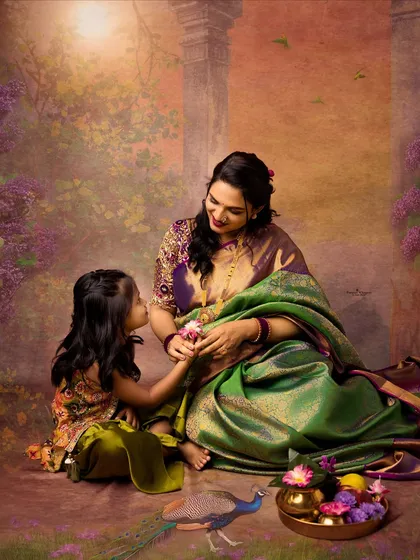 A mother's love blossoms alongside her daughter's curiosity. This heartwarming portrait captures a tender moment between mother and child during a traditional family shoot.