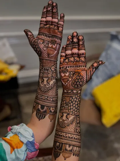 A beautiful design with peacocks and elephants, a classic combination.