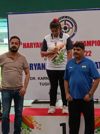 A moment of pride for a gold medalist at the Haryana Championship as she receives her award.