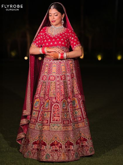 For the bride who loves artistry, this lehenga features detailed panel embroidery depicting traditional motifs. It’s a wearable piece of art for your special day.