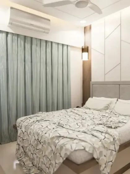 Another view of the bedroom, showing the overall layout and the calm, cohesive design.