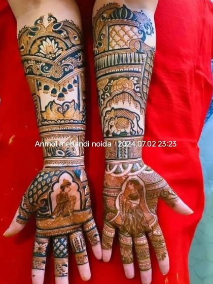 This design features classic bride and groom portraits on the palms, with elephants and traditional jharokha patterns extending up the arms.