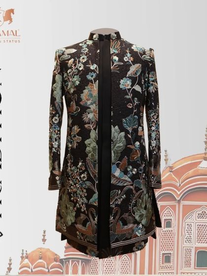A graphic of the black floral Indo-Western jacket, set against a traditional backdrop to emphasize the fusion of styles.