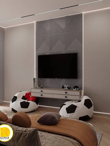 The TV and entertainment area in the kids' room, featuring a textured wall panel and a floating console.