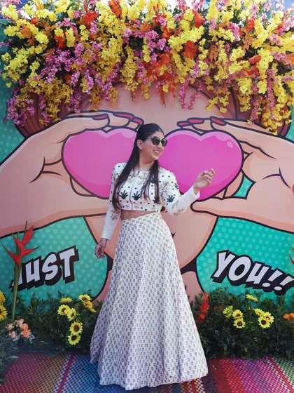Another shot from the quirky photo booth. The pop art style background was a unique and fun touch for the event.