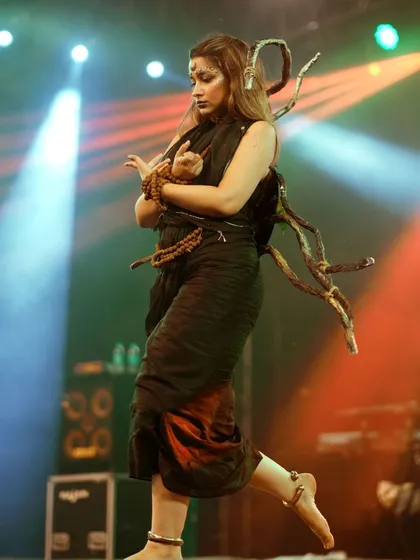 A student performer with unique, nature-inspired costume elements. I always look for these creative details that make college fests so special.