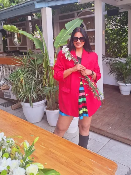 Adding a touch of nature with fresh flowers. This look is all about finding joy in the little things.