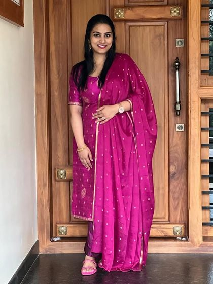The lovely Prathiksha in a custom pink salwar suit. The brocade fabric is complemented by a sheer dupatta with delicate butti work.