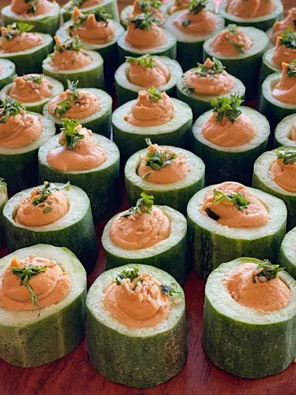 A closer look at our Paprika Hummus in Cucumber Canapés. This healthy and elegant appetizer is perfect for adding a pop of colour and freshness to your spread.
