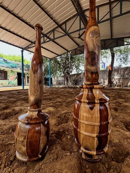 Our modern Gada and Mudgar, placed in the sacred soil of the akhara. It's a meeting of the past and the present.