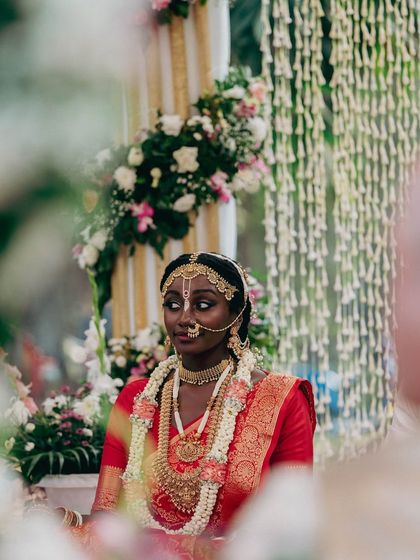 Draping for bride Syama was a beautiful experience. Her traditional red silk saree for her Sanatani wedding ceremony was draped to honour the rituals while ensuring she felt comfortable and radiant.