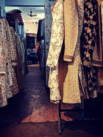 The aisles of my store are filled with countless options for men's occasion wear. I have everything from traditional prints to modern floral designs.