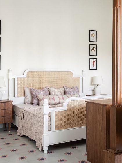 This bedroom is absolutely delicate. A soft and subtle palette of white and wood lends a cozy vibe. We added just a hint of color in the custom cement tiled flooring and repeated the same blush tone in the furnishings for a simple and elegant space.