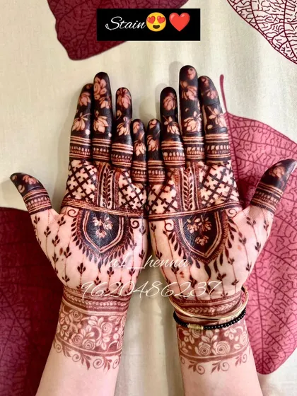 This photo showcases the incredibly dark and rich stain achieved with my organic henna cones. The deep color on the palms is exactly what you want for a long-lasting and impressive design.