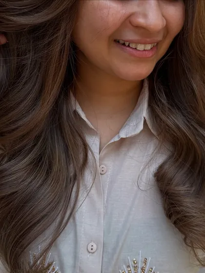 This is what a 'Beige Color Refresh' looks like. We took her faded, brassy hair and transformed it into this soft, beautiful beige blonde with a healthy shine.