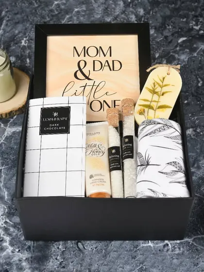 We create gifts for life's most precious moments. This "New Parents" hamper is a perfect example, thoughtfully combining pampering items for mom and dad with a little something for their new arrival.