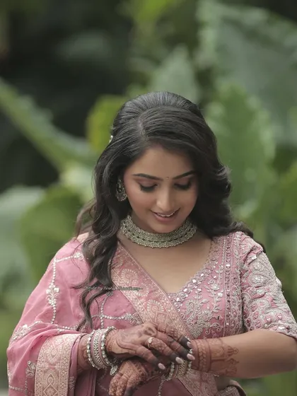 An absolutely beautiful engagement bride. I created a minimal yet glamorous look with soft pink tones on the eyes and cheeks to match her lovely outfit, finished with gentle waves in her hair.