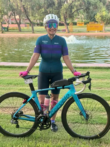 A proud owner and her Cervelo.
