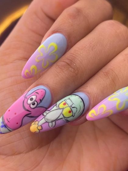 A continuation of our fun SpongeBob-themed set. Here you can see the hand-painted detail on Patrick and Squidward, showcasing my ability to capture character personalities in nail art.