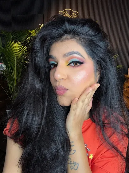 Another creative look using the color wheel. This features a mix of yellow, pink, and turquoise for a fun, artistic style.