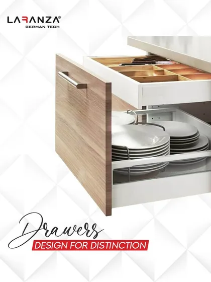 My drawers are designed for distinction. This example shows a combination of a wooden cutlery organizer on top and a deep plate drawer below, all gliding smoothly.