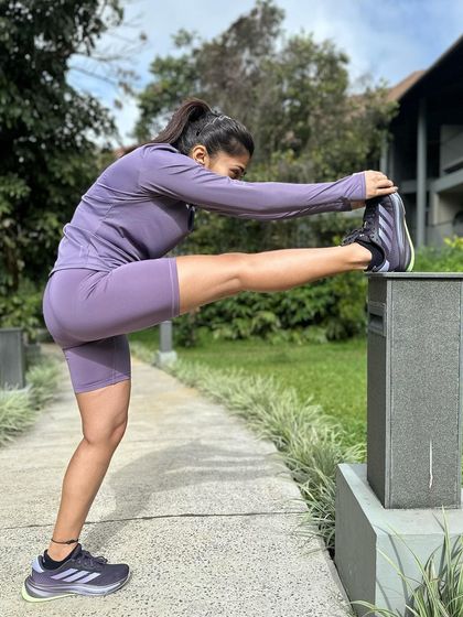 A post-run stretch showcasing the sleek design of the Supernova Rise. The reflective elements are also a great safety feature for early morning or evening runs.