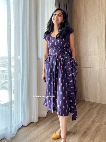 I love how this purple Ikat pinafore dress combines heritage with a modern soul. It's a testament to timeless craft and comfortable design.