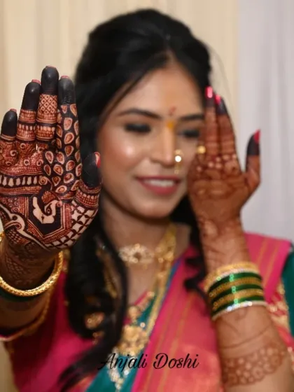The final result is everything. Here you can see the beautiful, deep reddish-brown stain my natural henna leaves behind. This bride is joyfully showing off her intricate design, which is the perfect accessory for her wedding day.