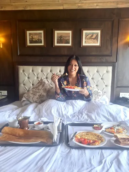 Breakfast in bed is one of the ultimate luxuries. Here I am enjoying a delicious spread at Koti Resort, Shimla, showcasing their impeccable room service.