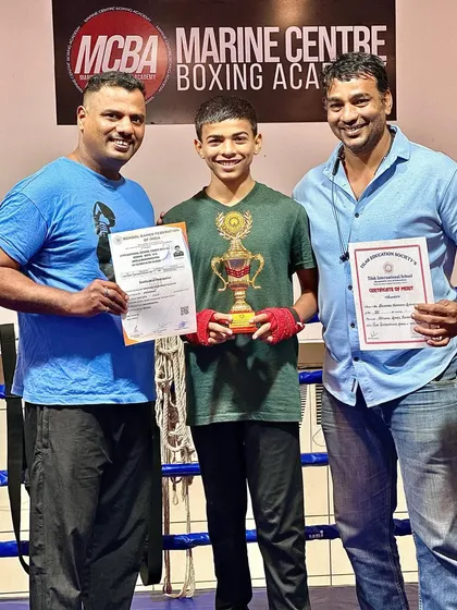 Himanshu Dudhade with his coaches, celebrating his "Sportsperson of the Year" award.