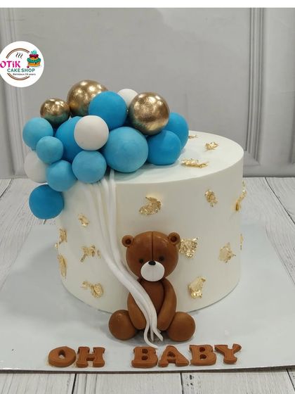 Another view of our popular teddy bear and balloons baby shower cake. We can customize the balloon colors to match your party's theme.