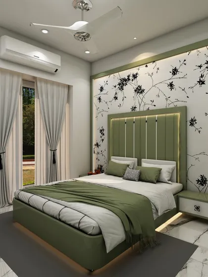 This bedroom features a beautiful green upholstered bed with an integrated backlit headboard, set against a delicate floral wallpaper for a fresh and serene look.