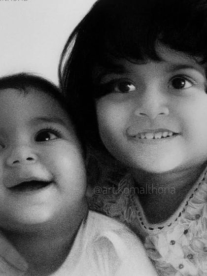 A heartwarming portrait of two young siblings, capturing their innocent smiles and the bond between them.