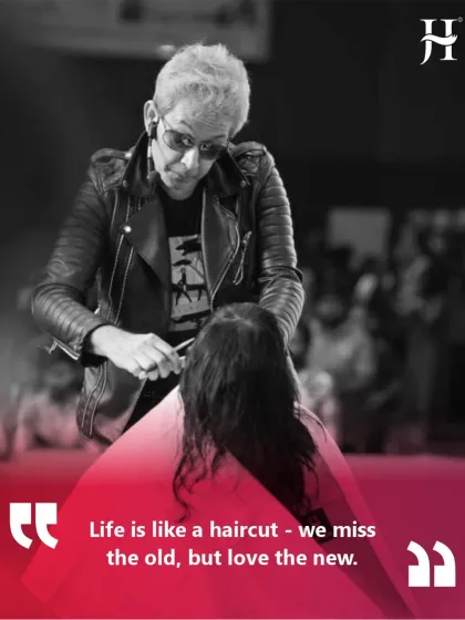 I am giving a client a precision haircut in this shot. I believe life is like a haircut. You might miss the old, but you will love the new. Change is the essence of style, and a good cut is the first step.