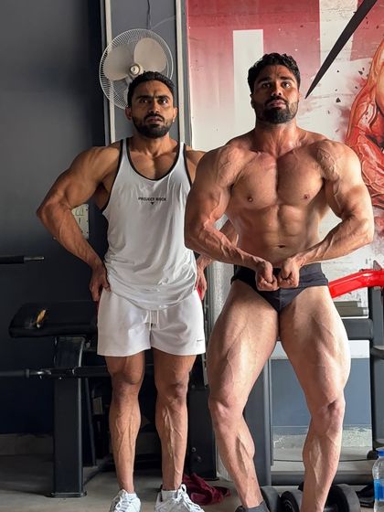 Coming soon. Posing with my client, checking his progress. We are building a champion physique, one workout at a time.