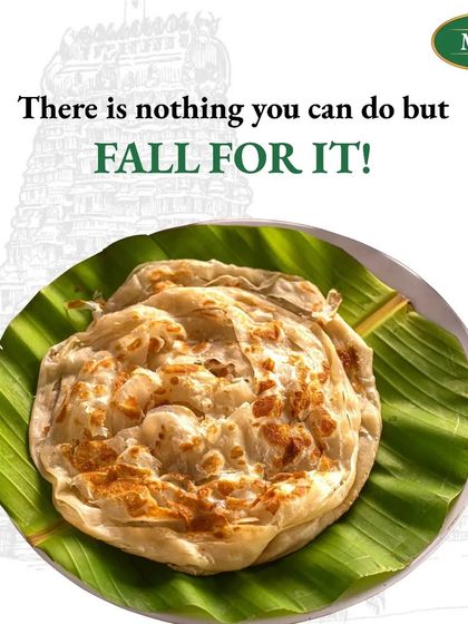 Our Ilai Parotta, or Banana Leaf Parotta, is a special dish where a flaky parotta is soaked in a generous amount of our home-made salna and steamed in a banana leaf.