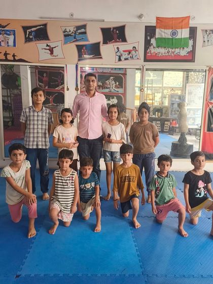 Another batch of dedicated young students at the academy. You can see the focus and determination in their posture, even after a demanding workout.