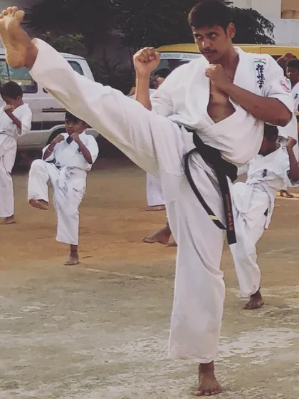 As a Sensei, I lead by example. A strong high kick (jodan geri) is a hallmark of Kyokushin training, and I practice alongside my students.